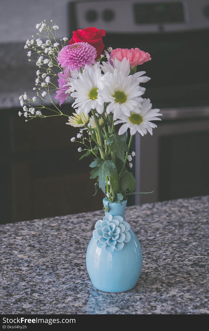 Assorted Flowers in Blue Vase