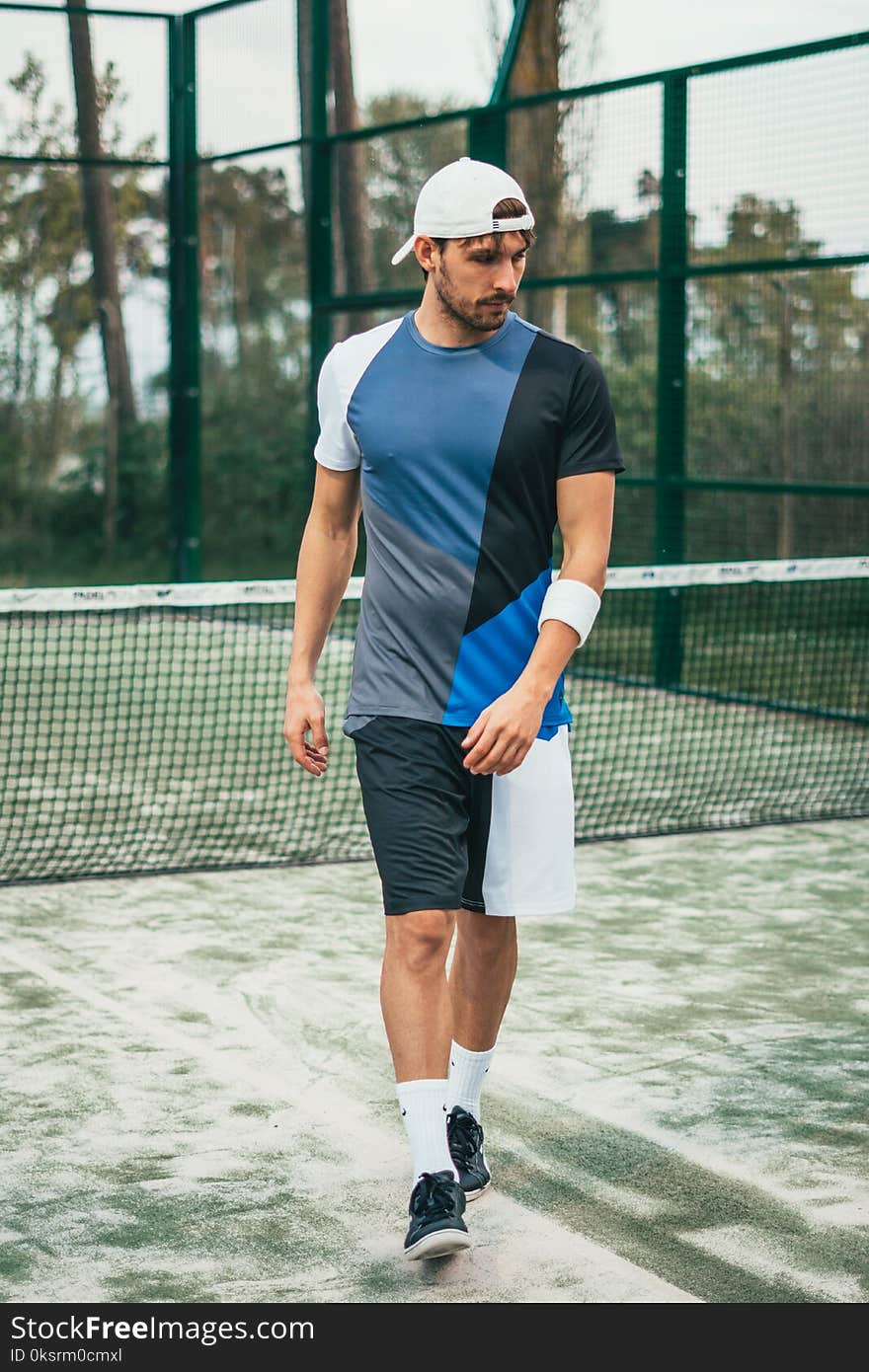 Man Wearing Blue, Gray, and Black Crew-neck Shirt