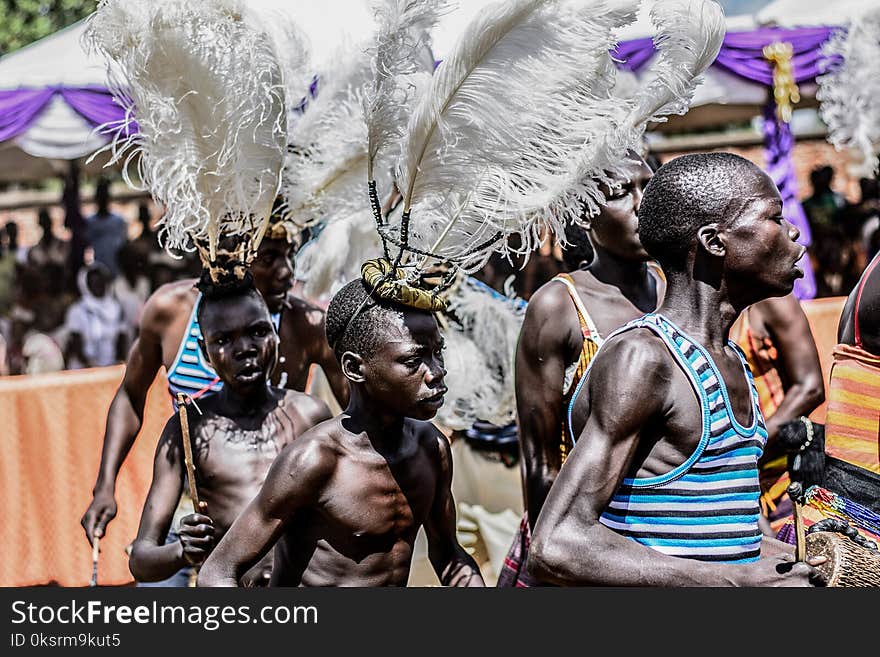 Group Of Boys With White Feather Headdress