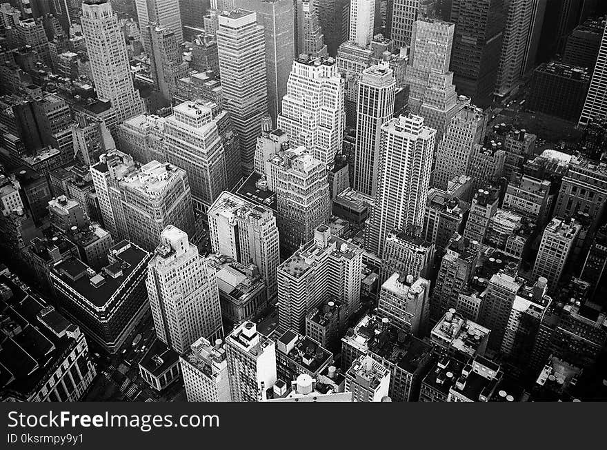 Aerial View and Grayscale Photography of High-rise Buildings