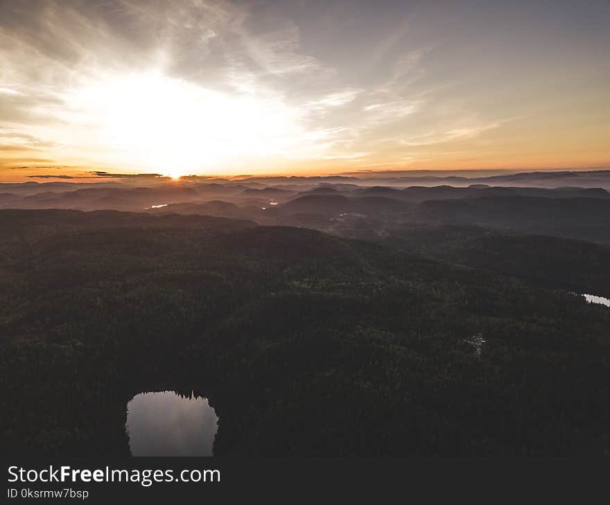 Aerial Photo of Mountains during Sunset