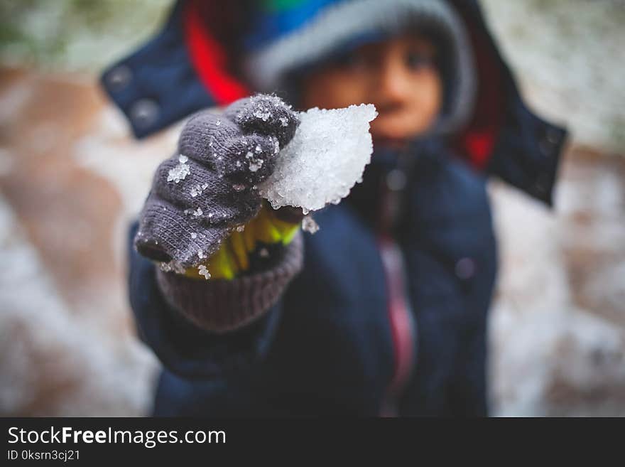 Person Holding Ice Shard