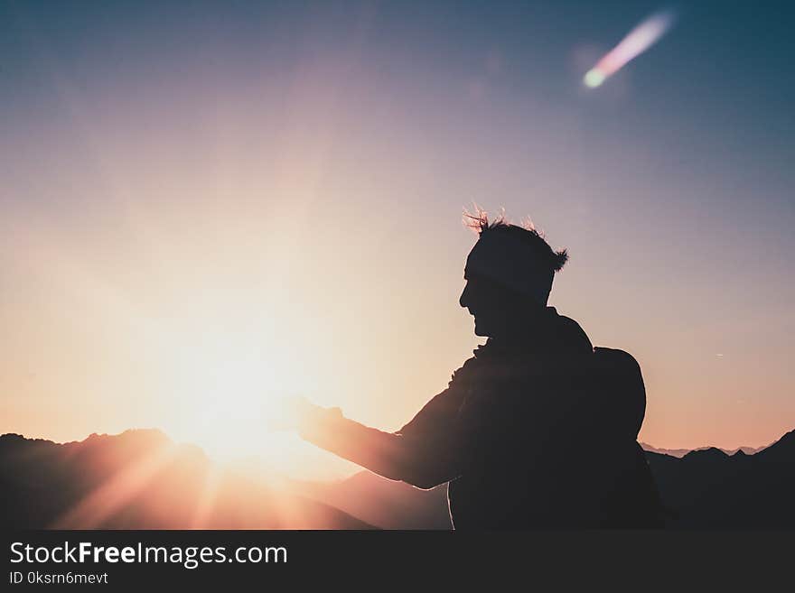 Silhouette of Man during Sunset