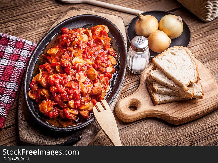 Lecho - stew with peppers, onions and sausages.