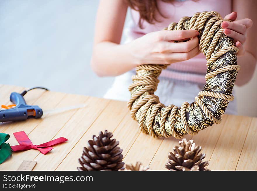 The Woman Doiing Diy Festive Decorations At Home