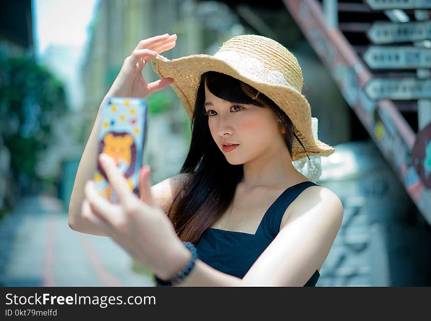 Woman Wearing Brown Summer Hat