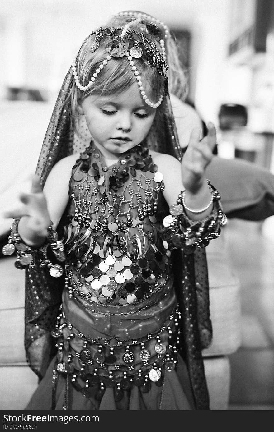 Grayscale Photo of Girl Wearing Traditional Dress