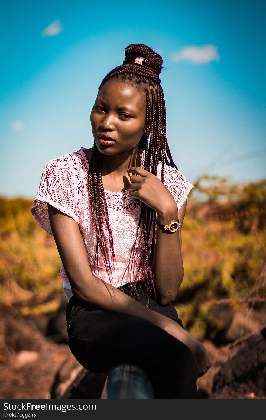 Selective Focus Photography of Woman Wearing Pink Lace Blouse