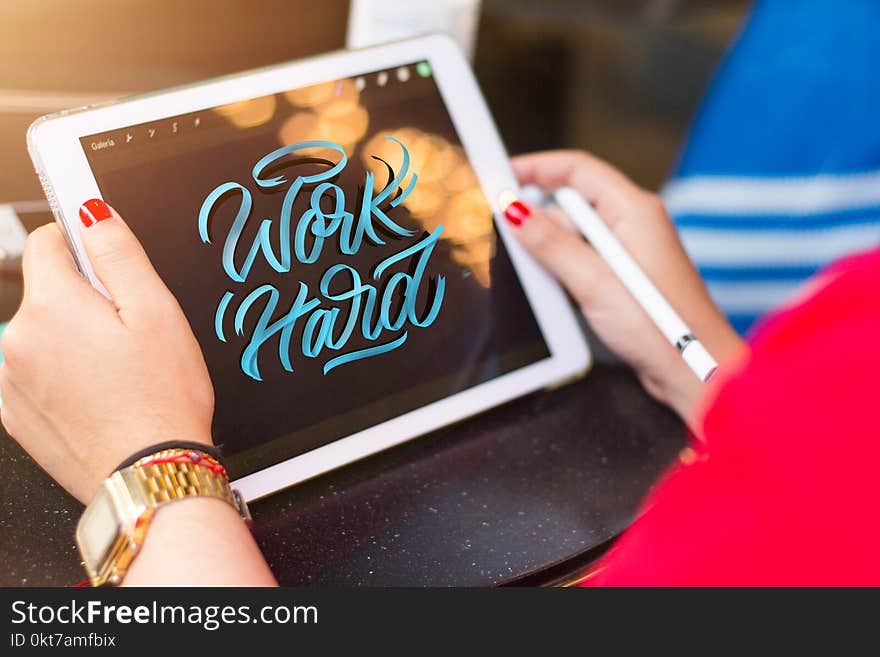 Woman Holding White Tablet Computer