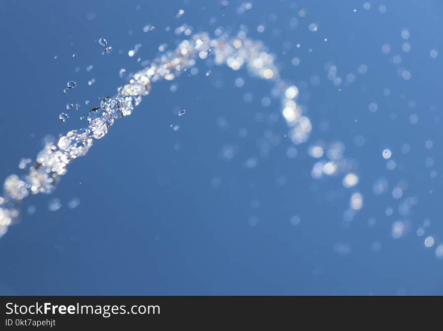 Shallow Focus Photography of Water Drops