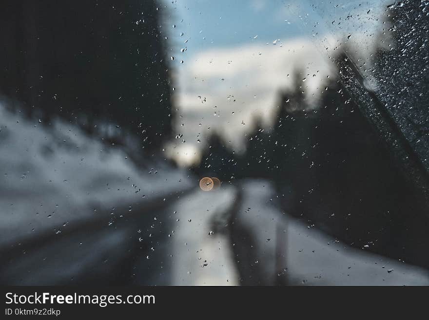 Photography of Raindrops on Glass