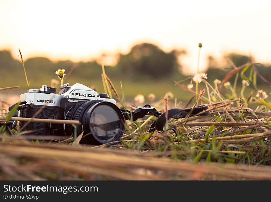 Photo of Black and Grey Fujida Dslr Camera Photo Taken during Daytie