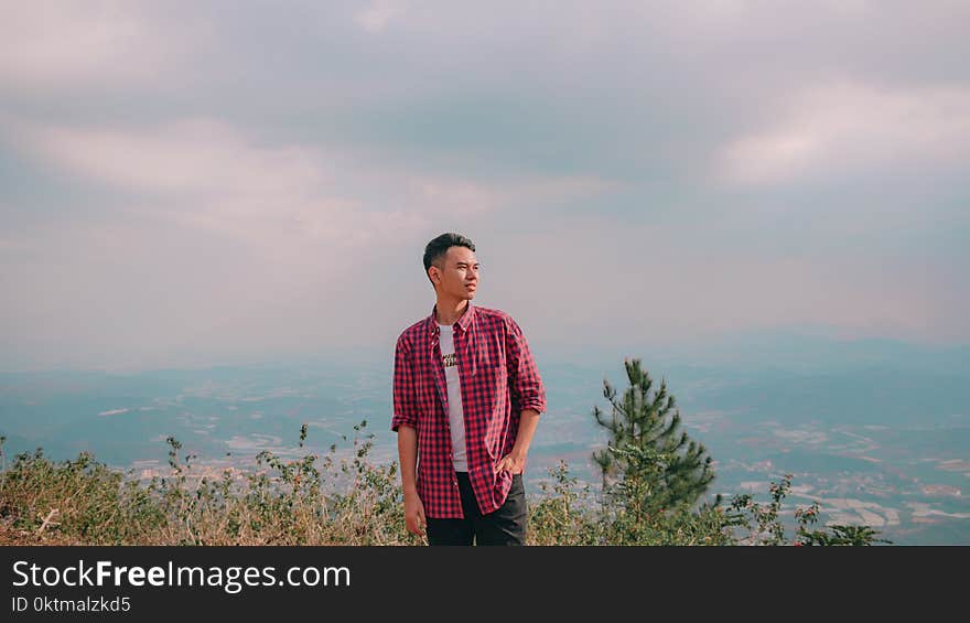 Man in Red Button-up Shirt Standing