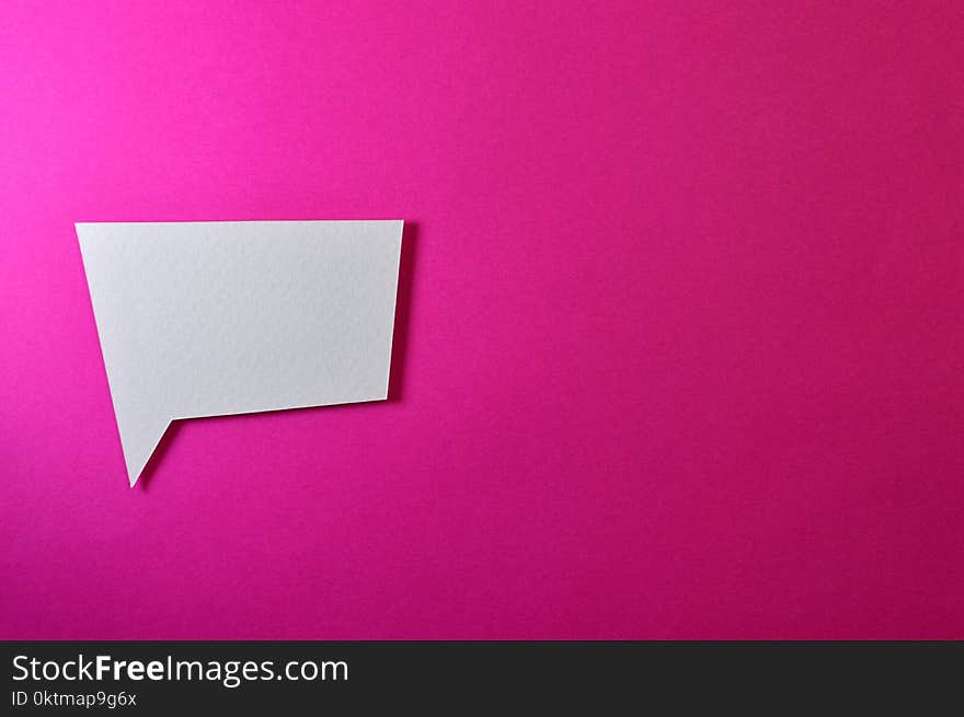 White Chat Logo on Pink Background