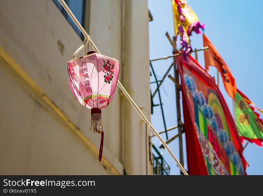 Low Angle Photo of Pink Lantern Decor