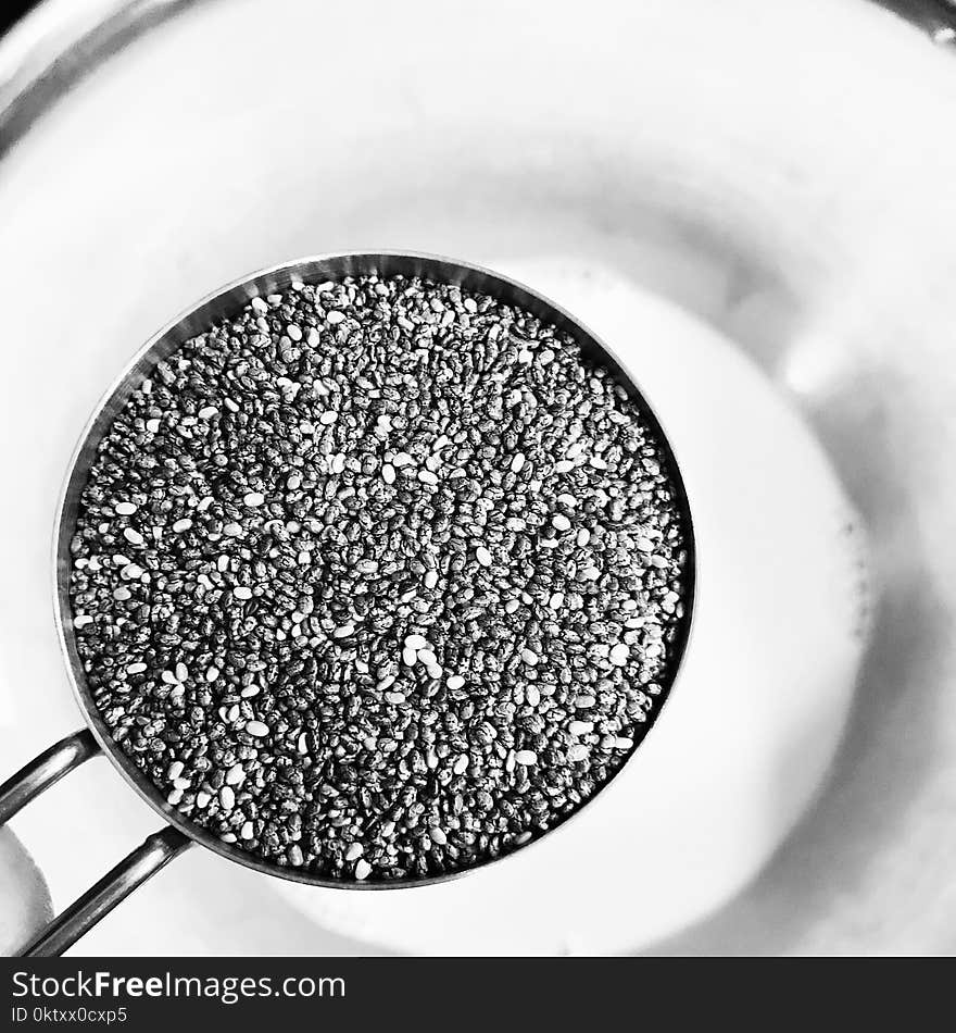 Grayscale Photography of Grains on Cook Pot