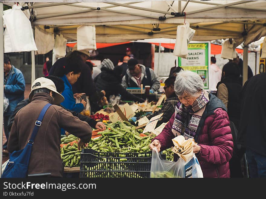 Group of People in Marketplace