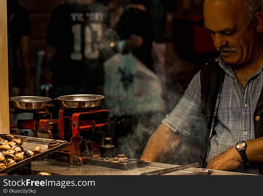 Photography of Man in Plaid Shirt