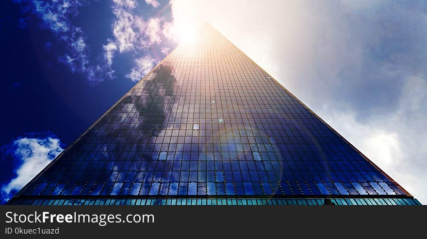 Low Angle Photograph of Pyramid Glass during Calm Weather