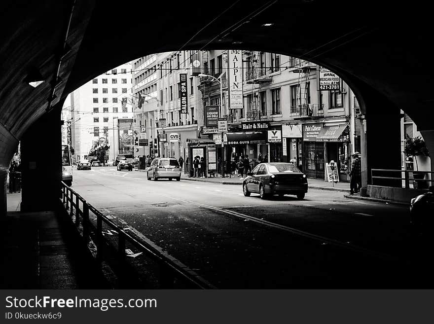 Grayscale Photography of Vehicle on Road