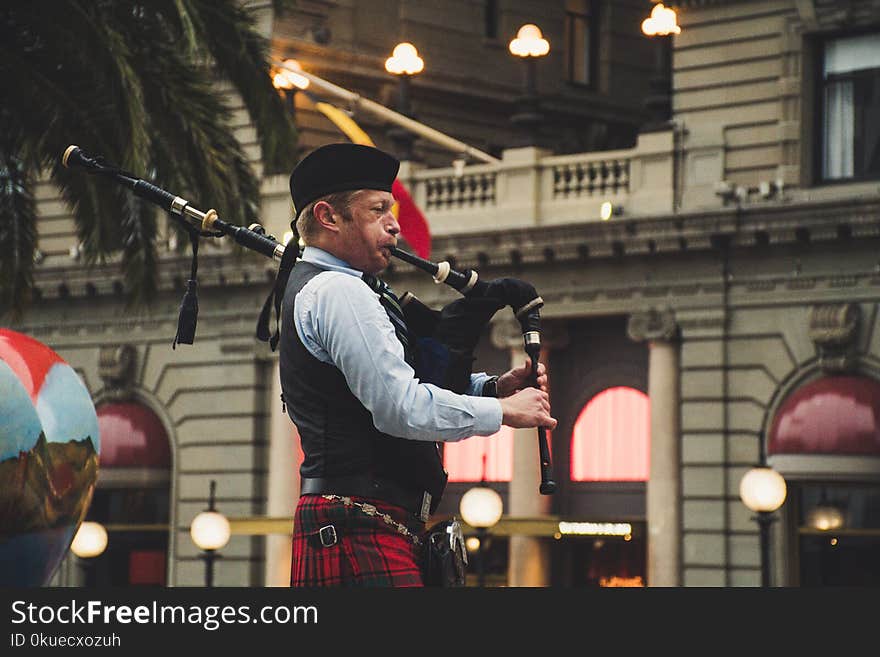 Man Playing Wind Instrument