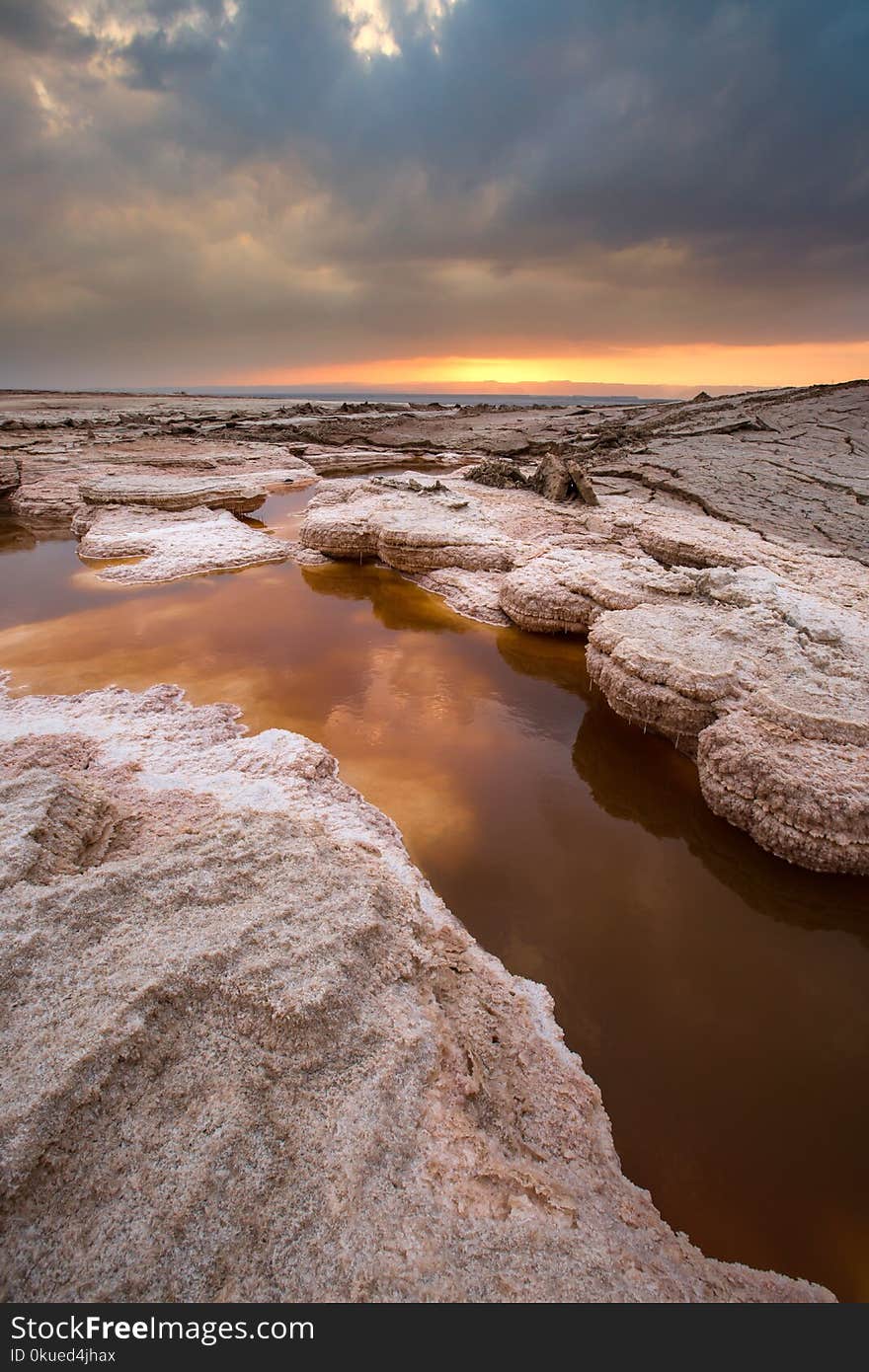 Landscape Photography of Rocky Place Under Gray Sky