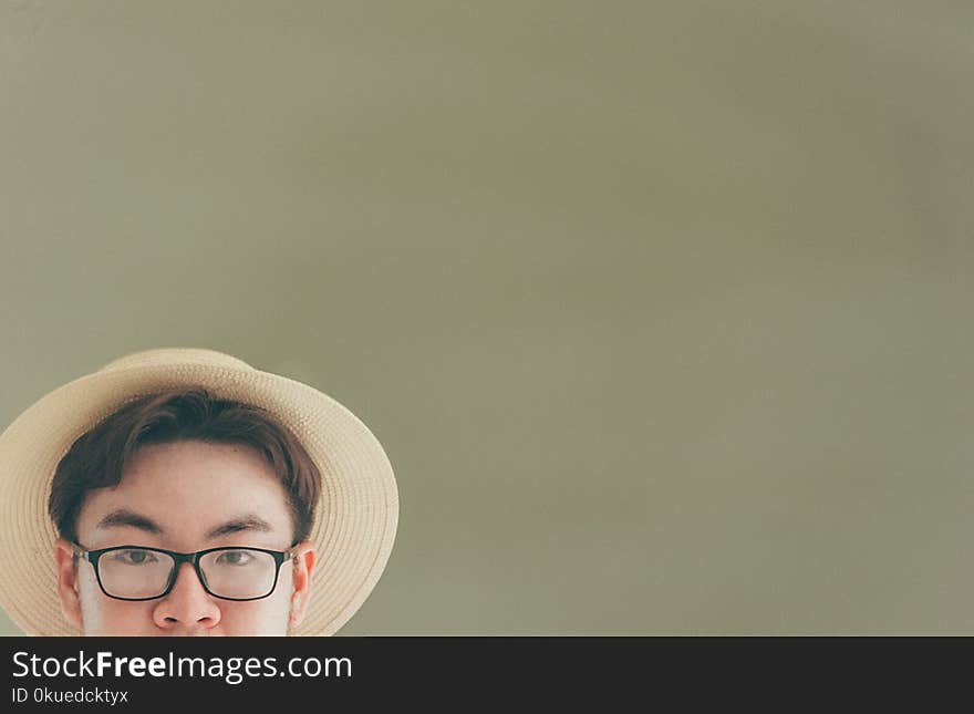 Man Wearing Brown Straw Hat