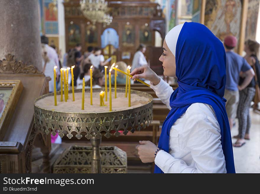 Woman Holding Candle