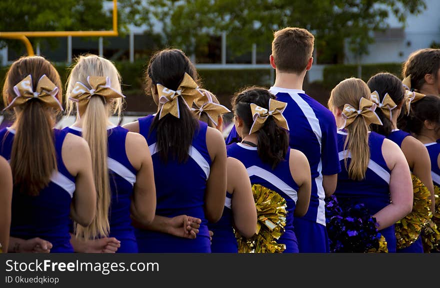 Photo of Cheerleaders in Blue-and-white Uniform