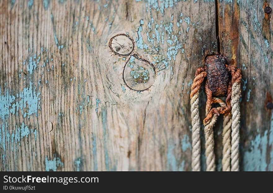 Brown Wooden Board With Rope