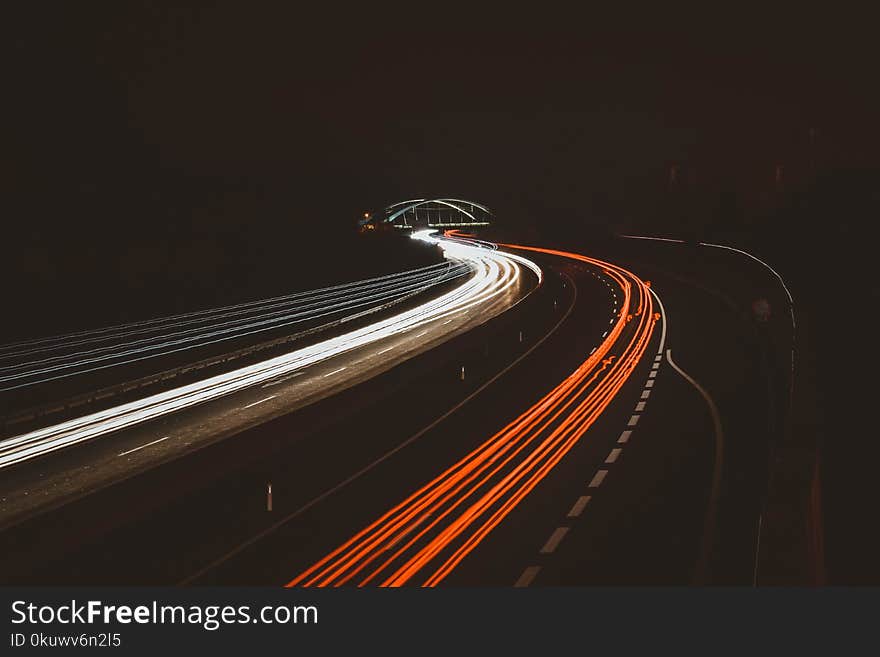 Time Lapse Photography Of Vehicles On Road During Nightime