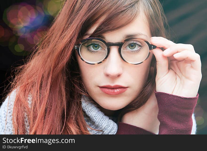 Woman With Brown Hair Wearing Eyeglasses