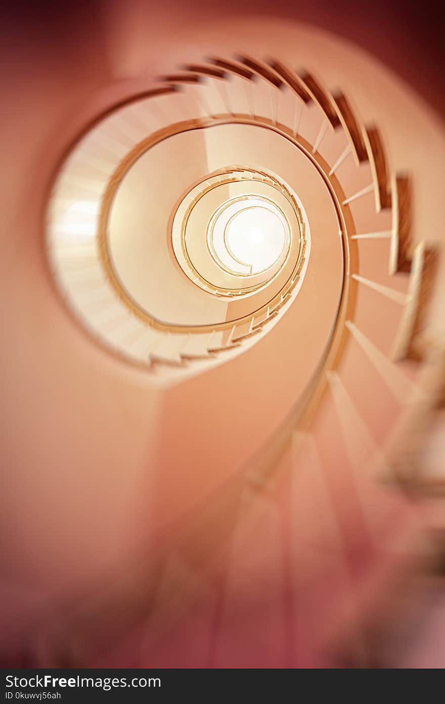 Low Angle Photography of Spiral Stair