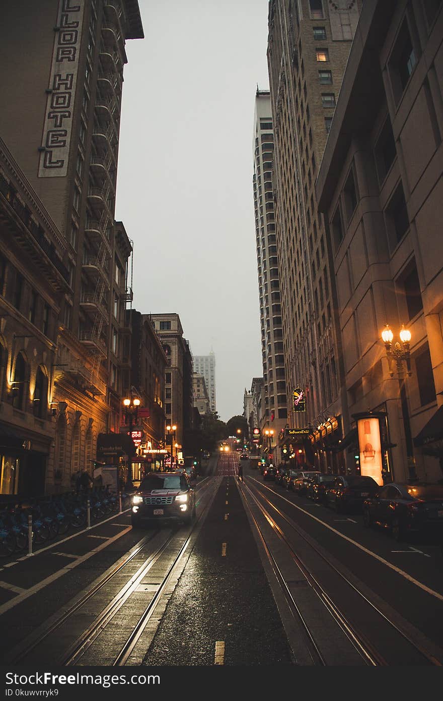 Gray Concrete Buildings Beside Road