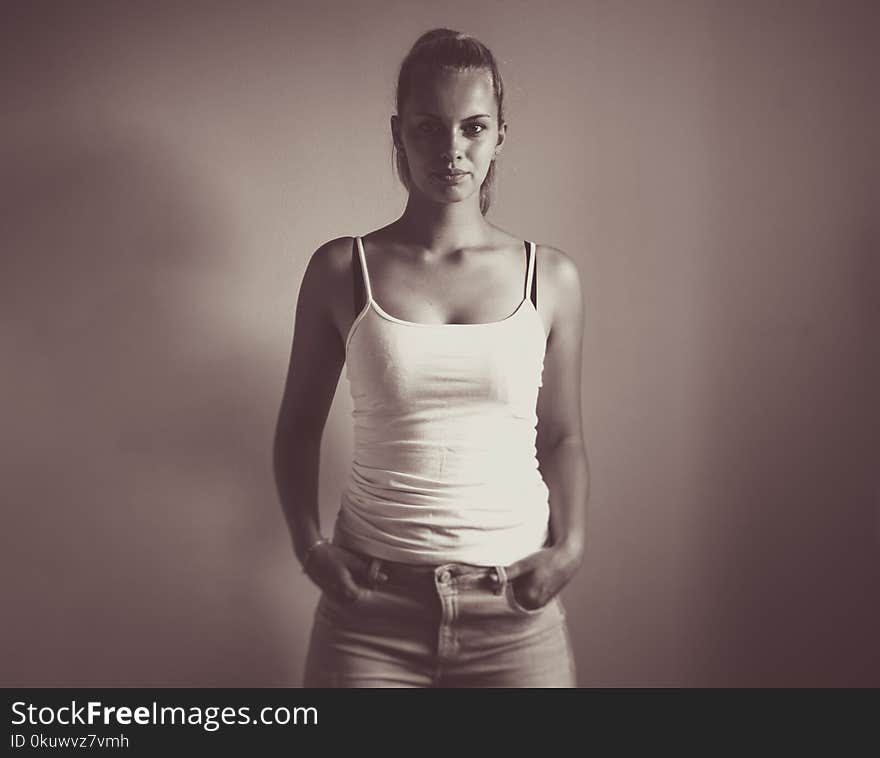 Sepia Photography of Woman Wearing White Camisole