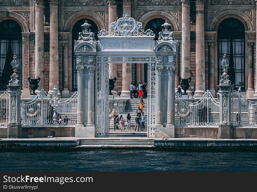 Group of Person on Concrete Building Stair