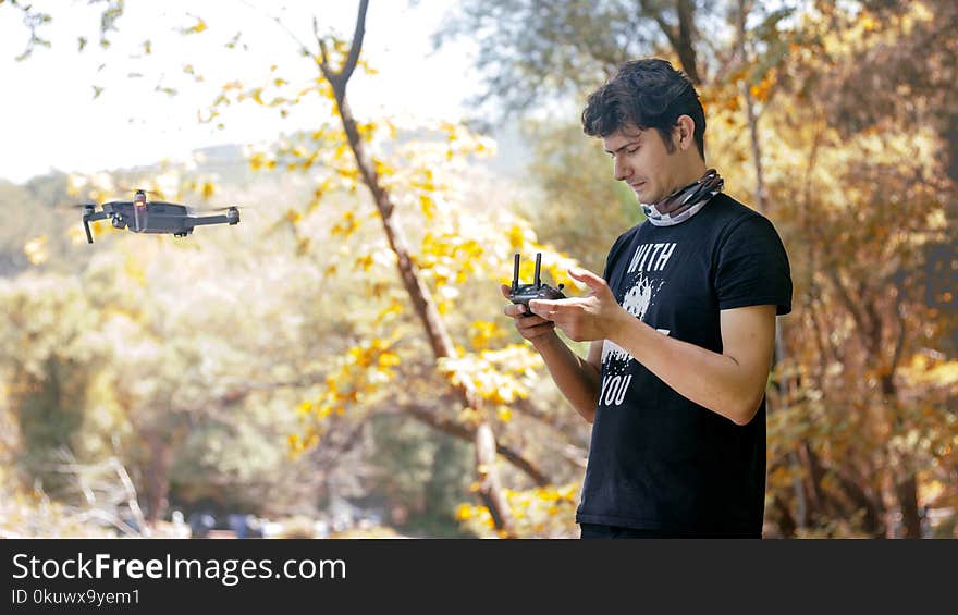 Man Holding Dji Mavic Pro Controller