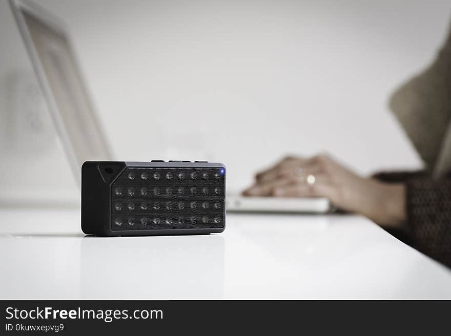 Black Bluetooth Speaker on White Table