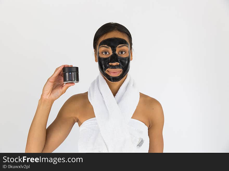 Woman Holding Black Mask