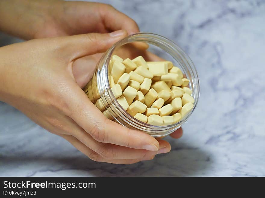 Person Holding Jar