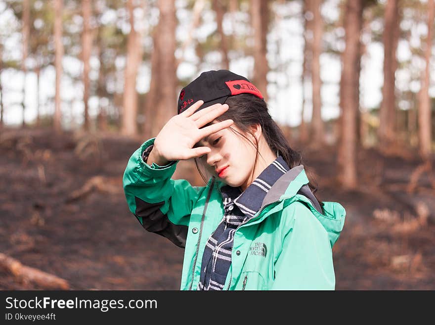 Woman Wearing Green and Grey Jacket