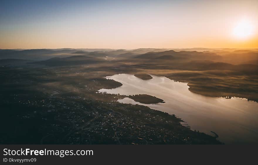 Body Of Water During Golden Hour