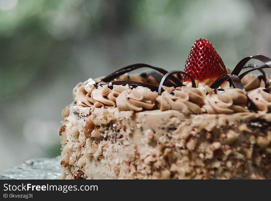 Shallow Focus Photography Cake With Red Strawberry on Top