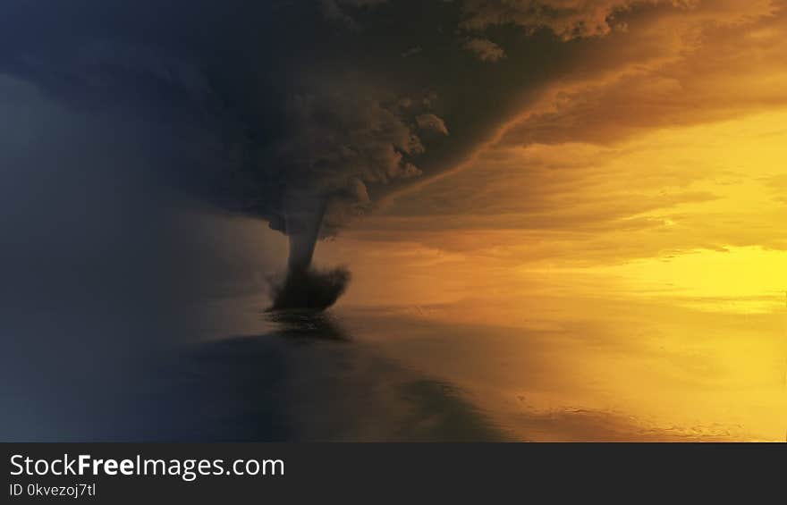 Tornado on Body of Water during Golden Hour