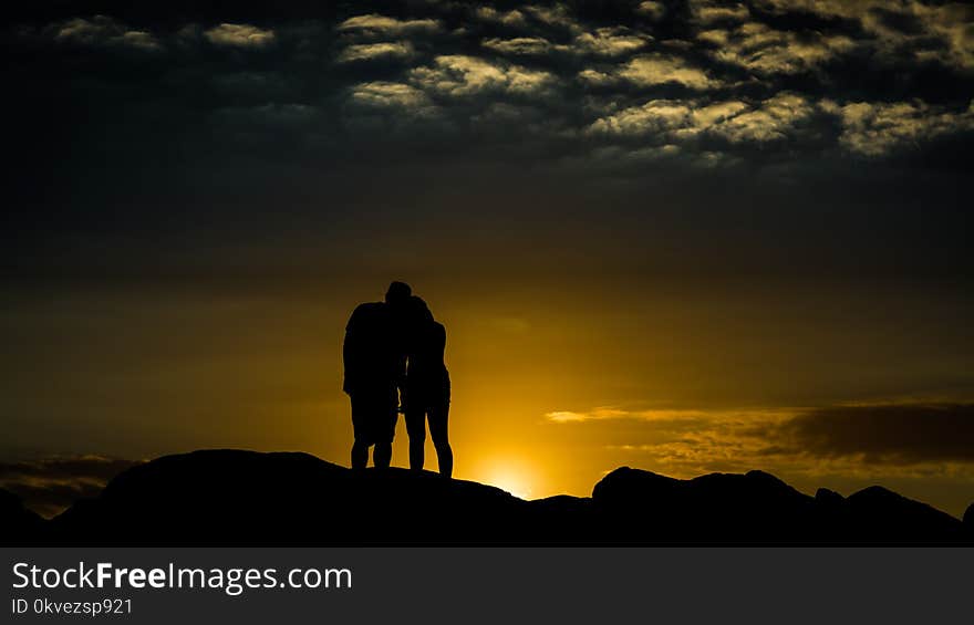 Silhouette Photo of Man and Woman