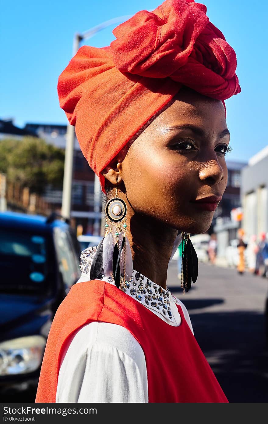 Woman in Red and White Collared Top