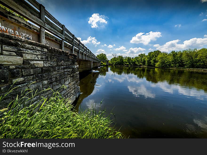 Gray Steel Bridge Near Body of Water