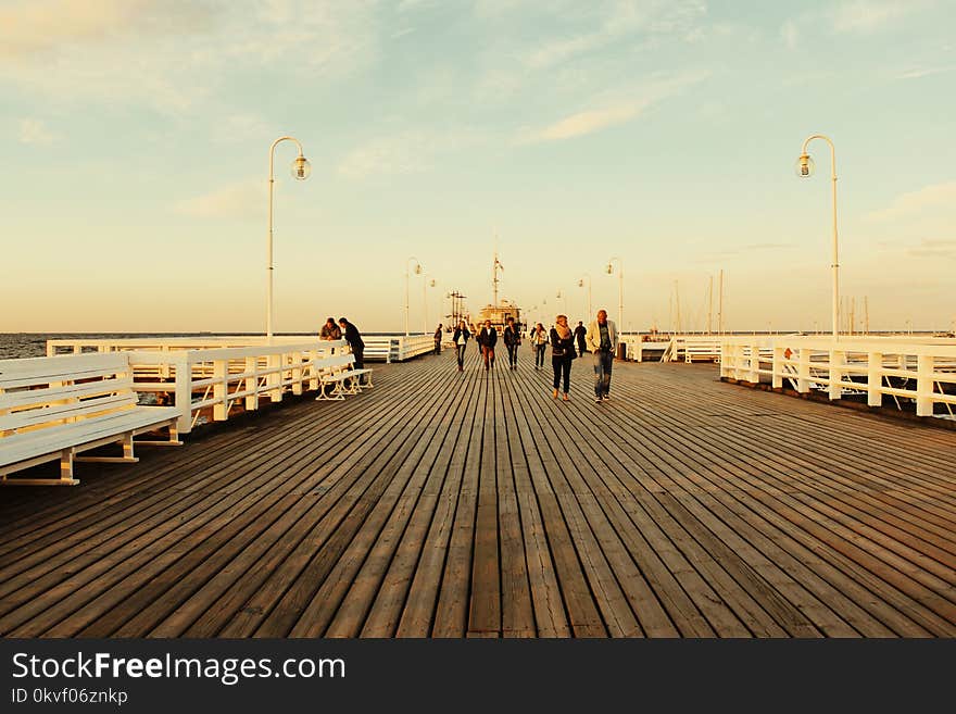 People Walking on Board Walk