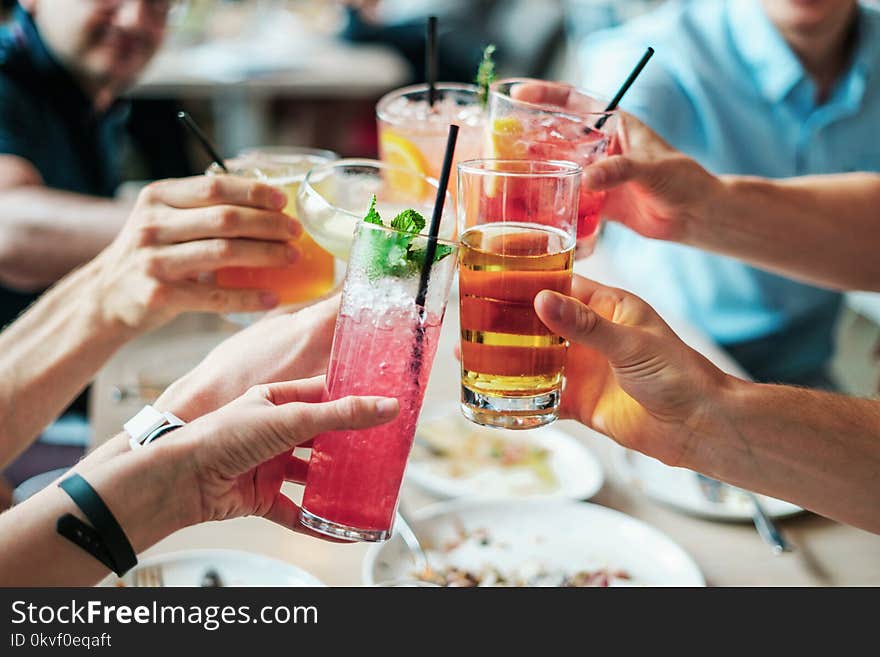 Group of People Doing Cheers