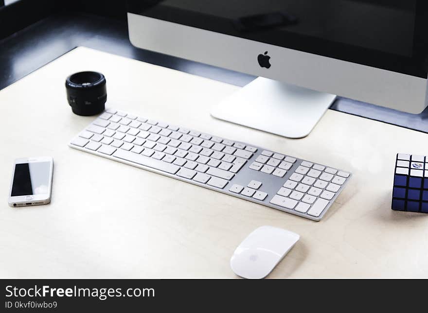 Imac Beside Apple Wireless Keyboard And Magic Mouse